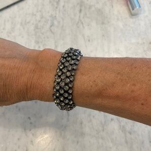 Three costume jewelry bracelets